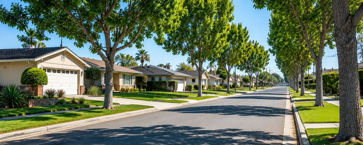 Buy a home in Burbank CA — get 1% cash back Burbank tree-lined residential street with single-story ranch homes and green lawns — Portfolio Home Realty buyer agent