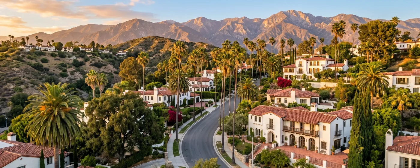Buy a home in Glendale CA — get 1% cash back Glendale Spanish Colonial hillside homes with palm trees and San Gabriel Mountains at golden hour — Portfolio Home Realty buyer agent