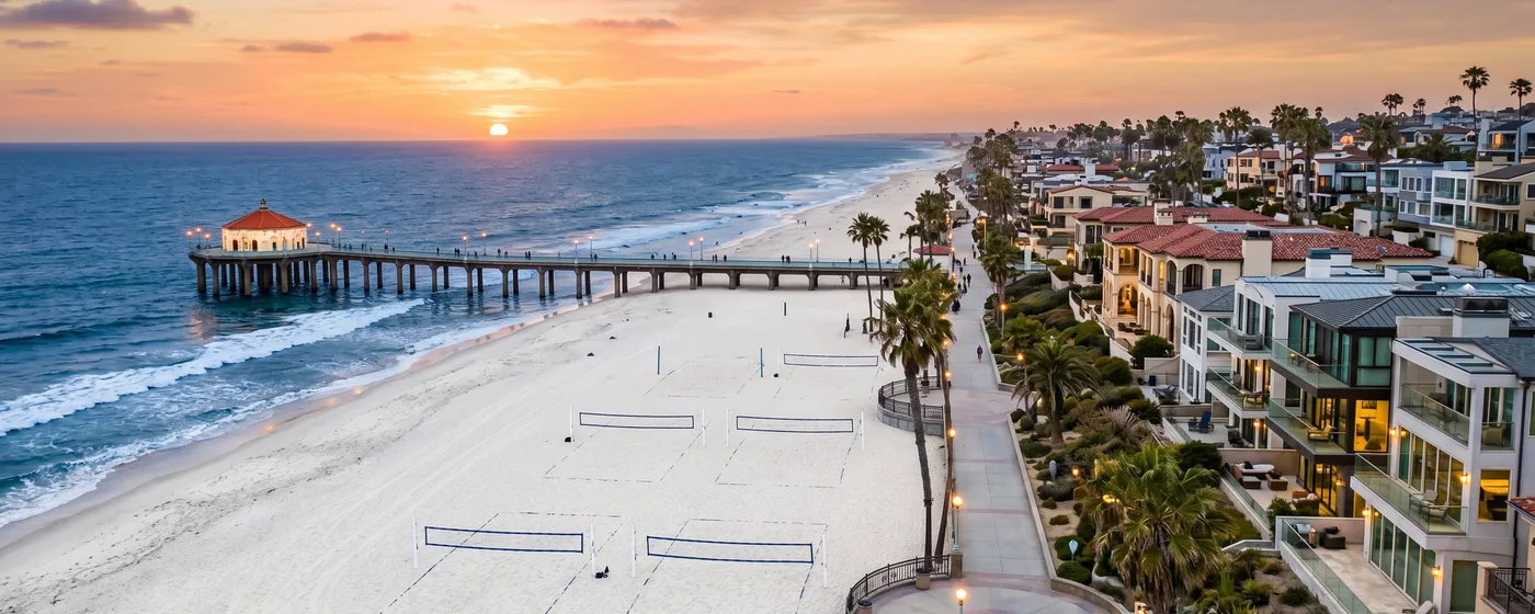 Buy a home in Manhattan Beach CA — get 1% cash back at closing Manhattan Beach Strand at sunset with iconic pier volleyball courts and beachfront homes — Portfolio Home Realty buyer agent