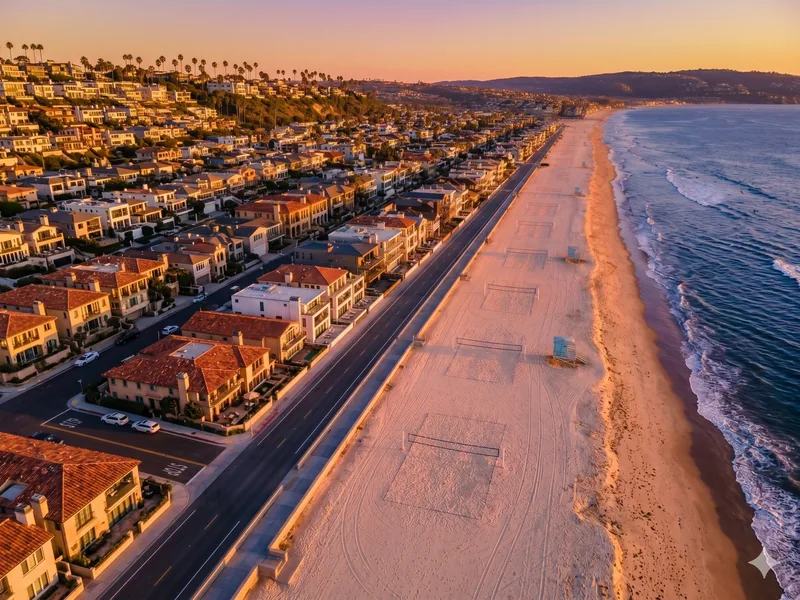 Aerial view of Southern California coastal community at sunset